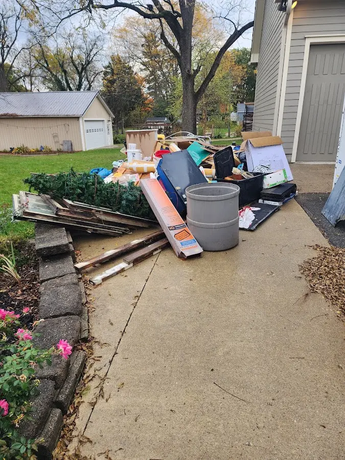 Dumpster being loaded with debris for Commercial Dumpster Rental in Chester